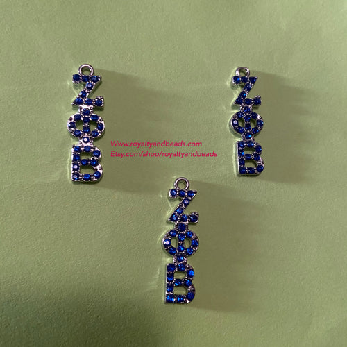 Blue rhinestone Zeta charm.