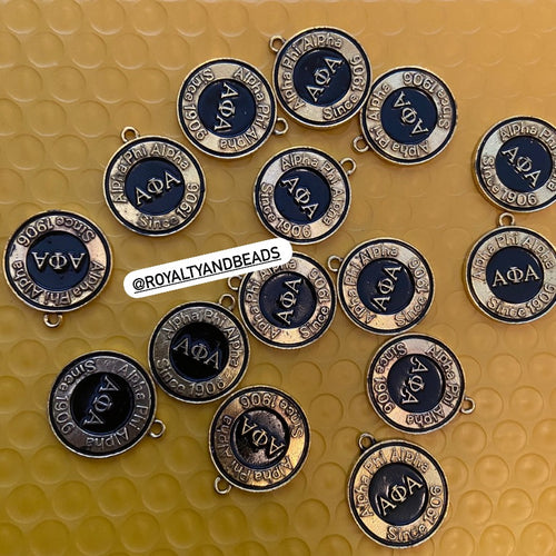 Alpha Circle charm.